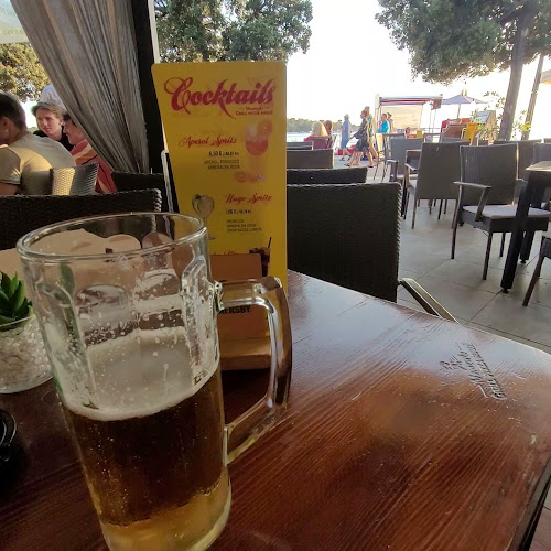 Opinii despre Momento Grill Pizza House în Novalja - Gastronomija i ugostiteljstvo